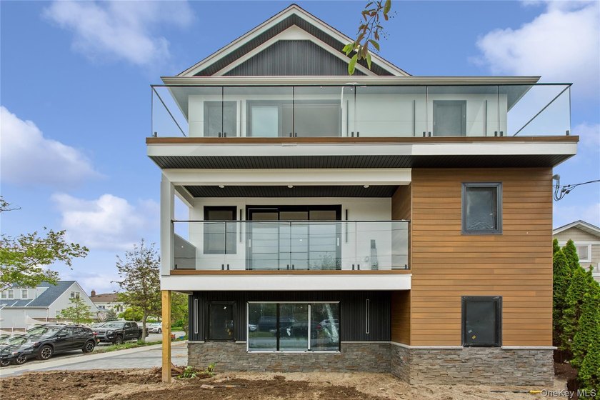 Stunning New Construction - Contemporary Coastal Living - photo 2