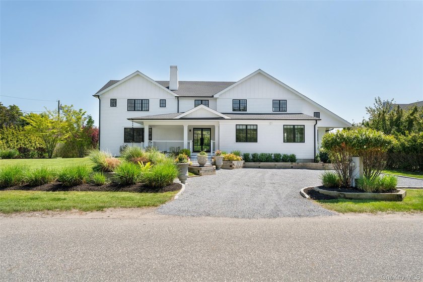 Set on 0.63 acres with waterside pool and 110Ft of bulkhead - photo 2