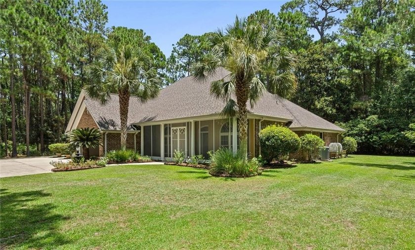 Perched on a quiet street on Dauphin Island's peaceful, highly - photo 2