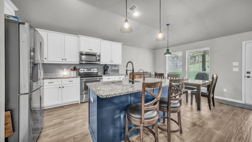 This stunning home is in pristine condition and sits on an - photo 11