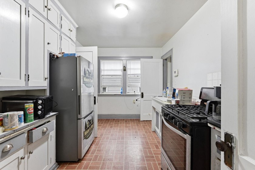 This 3-bedroom, 2-bath home with a detached 2-car garage is full - photo 8