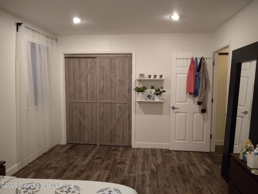 Enjoy easy living in this spacious two-bedroom apartment located - photo 2