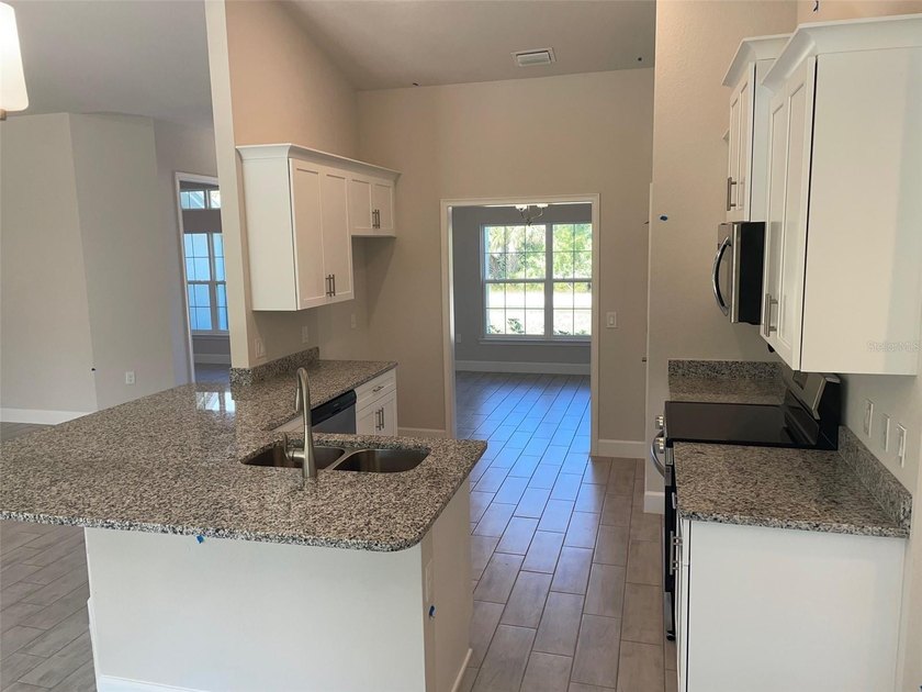 Under Construction. Beautiful 4 Bedrooms 2 Baths Home in Port - photo 3
