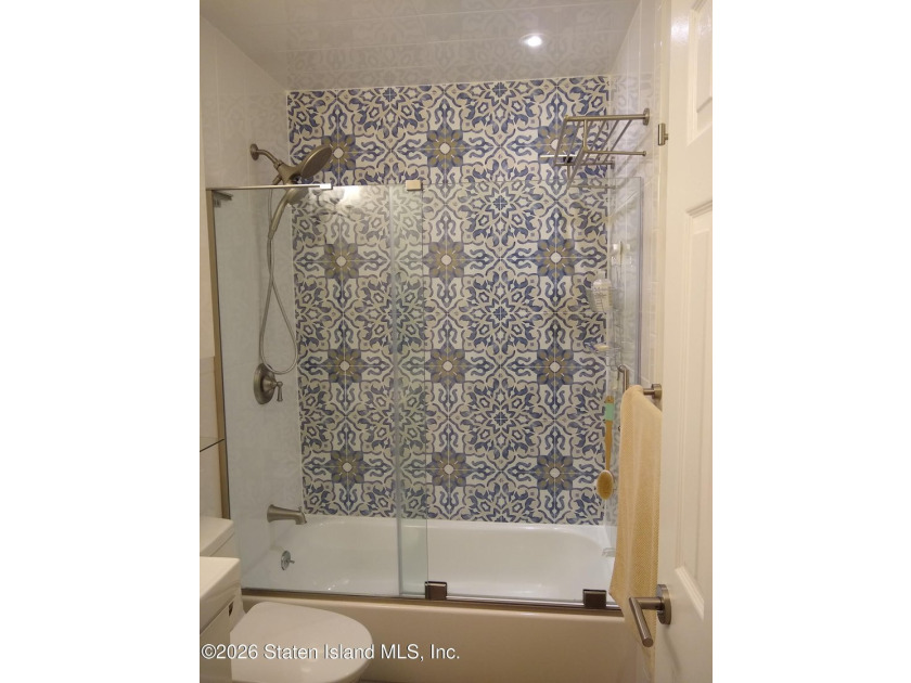 Enjoy easy living in this spacious two-bedroom apartment located - photo 3