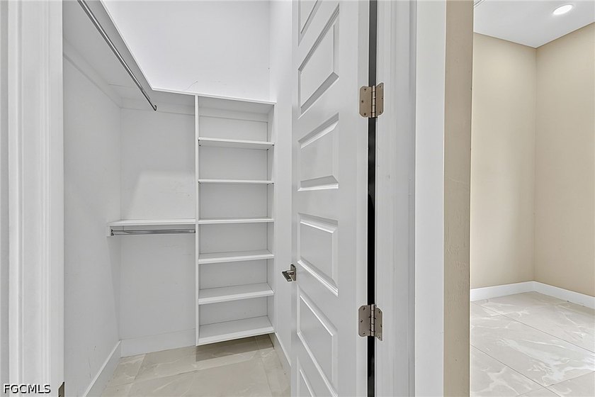 Set on an oversized corner lot, this exceptional custom - photo 33