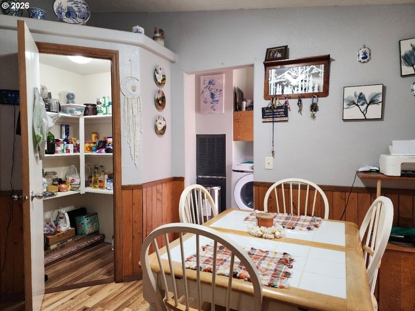 Tucked away among the trees on 1.16 private acres with a Large - photo 8