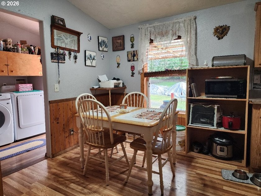 Tucked away among the trees on 1.16 private acres with a Large - photo 9