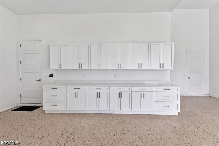 Set on an oversized corner lot, this exceptional custom - photo 50