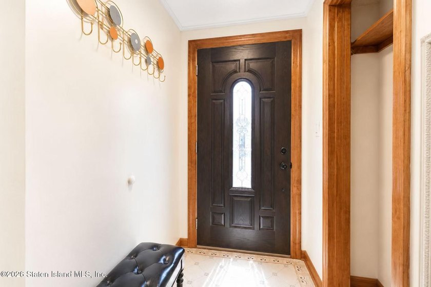 This is a beautifully renovated semi-attached brick - photo 5