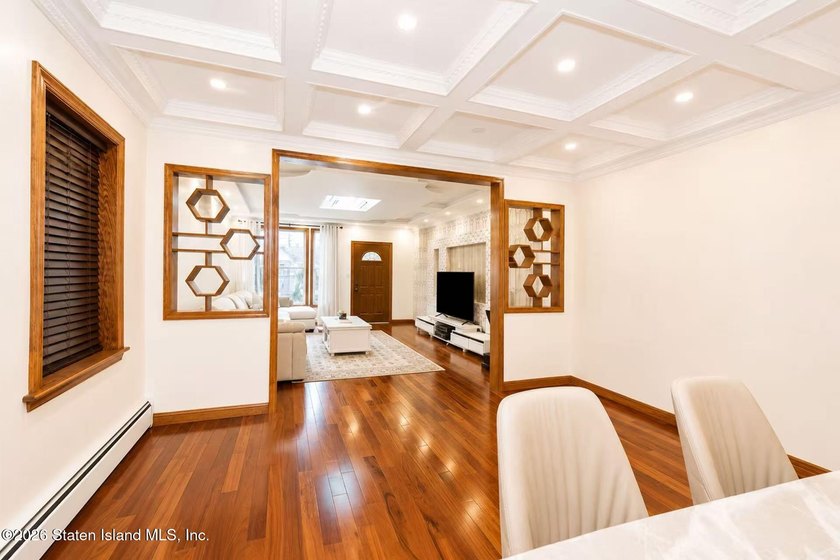 This is a beautifully renovated semi-attached brick - photo 9