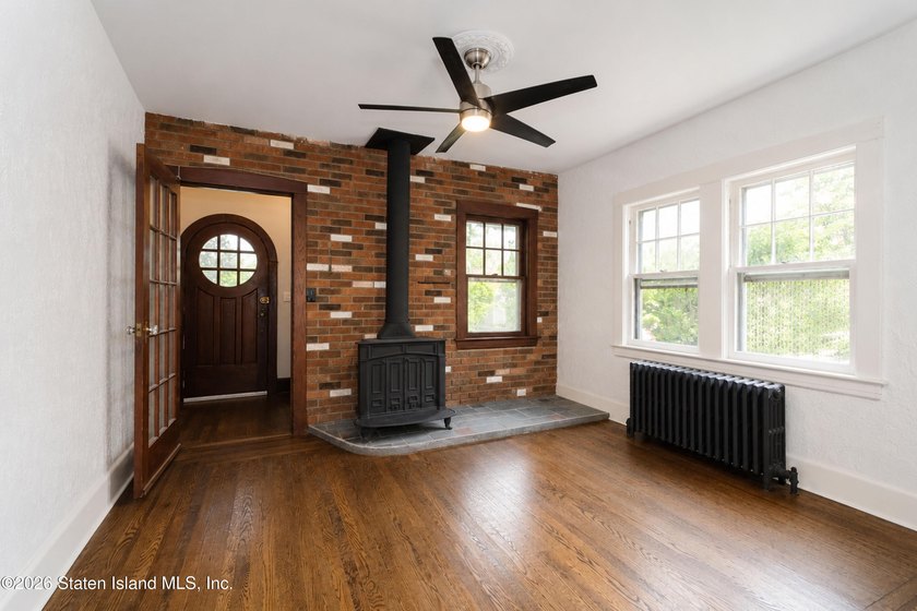 Welcome to 27 Hunton Street, a charming Tudor-style home nestled - photo 7