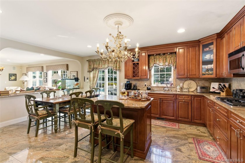 FLOWER HILL, ROSLYN | BRICK CENTER HALL COLONIAL. Located on a - photo 12