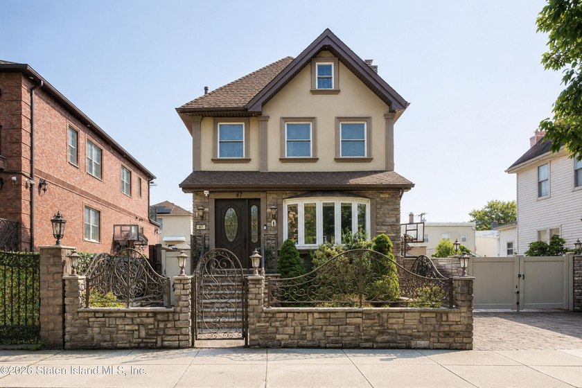 Welcome to this exceptional detached two-family residence where - photo 2