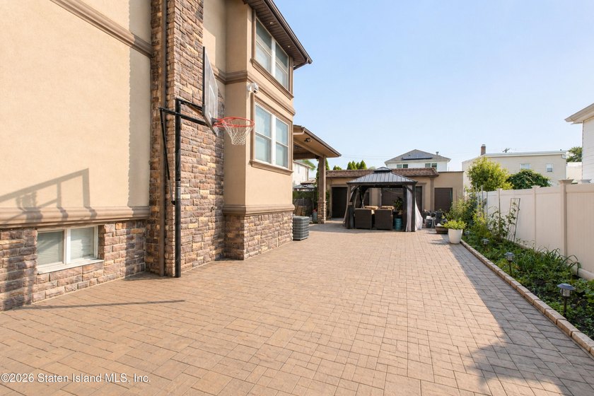 Welcome to this exceptional detached two-family residence where - photo 4