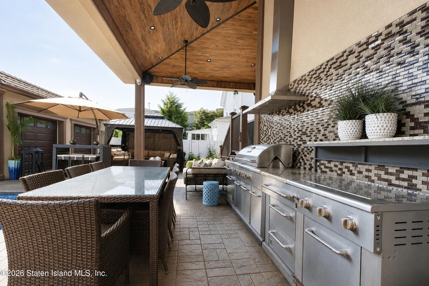 Welcome to this exceptional detached two-family residence where - photo 9
