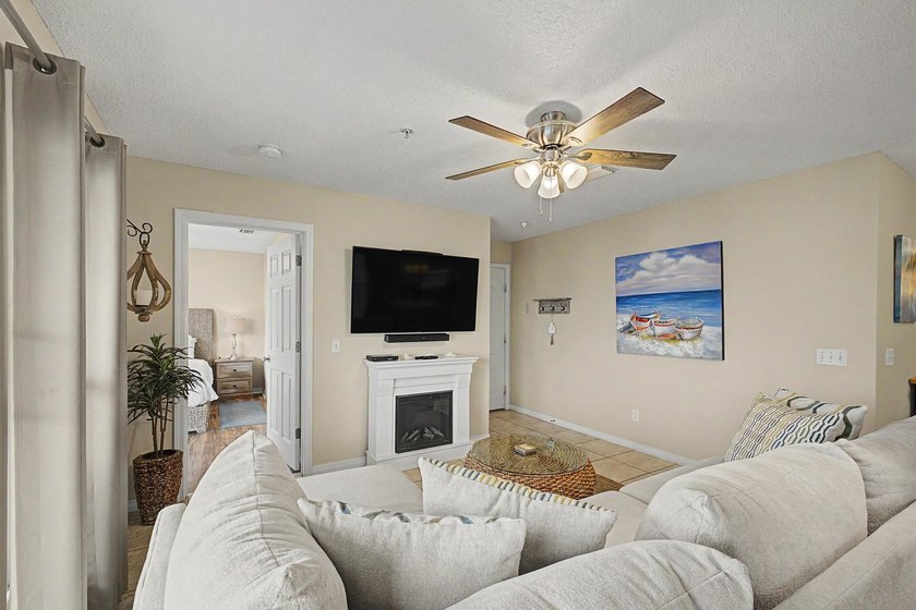 Fully furnished and turnkey, this beautifully maintained coastal - photo 8