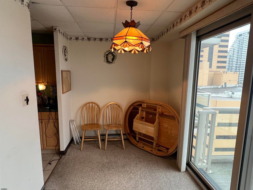 Spacious two-bedroom, one-bath condo with a large living room - photo 3