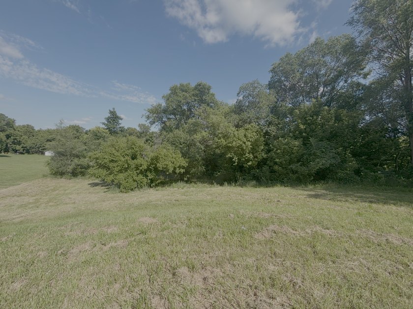 Here is a rare opportunity to own a 1.84-acre city lot in the - photo 2
