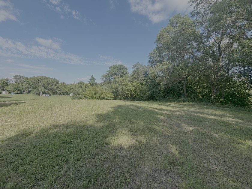 Here is a rare opportunity to own a 1.84-acre city lot in the - photo 3