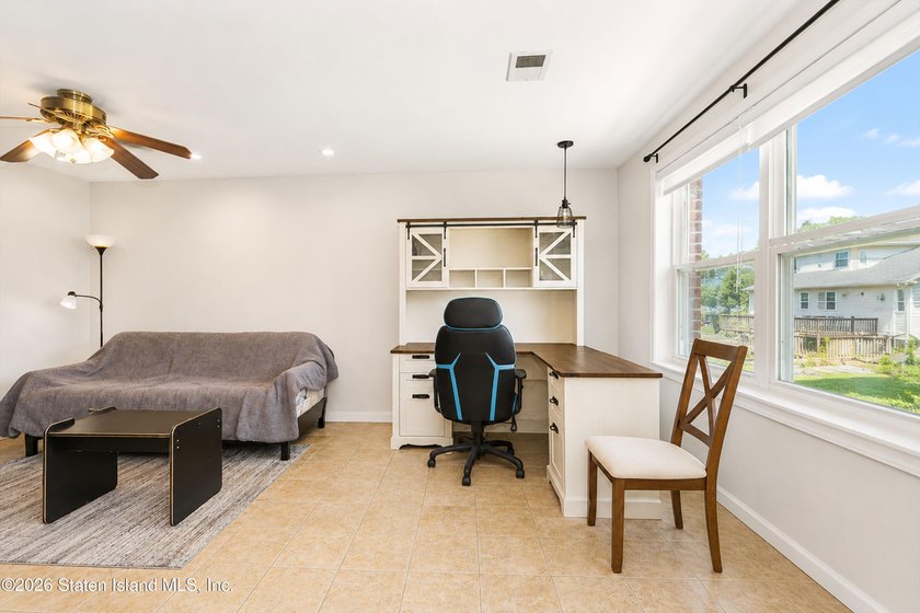 Welcome to this bright and beautifully updated second-floor - photo 8