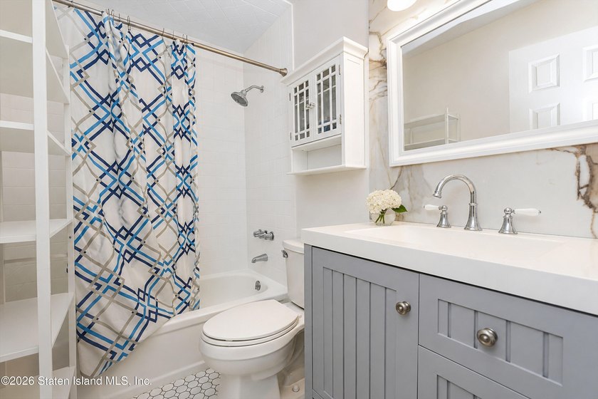 Welcome to this bright and beautifully updated second-floor - photo 10