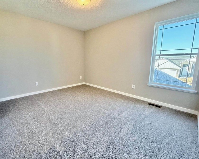 Highlights include a spacious 4 BAY GARAGE, Two Story modern - photo 12