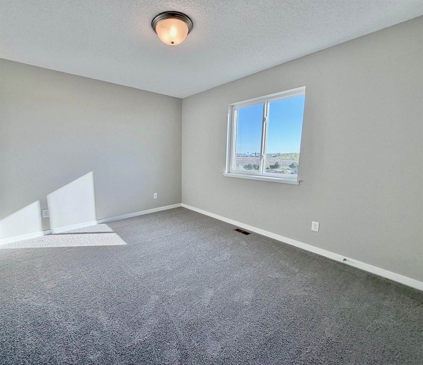 Highlights include a spacious 4 BAY GARAGE, Two Story modern - photo 14