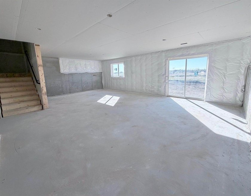 Highlights include a spacious 4 BAY GARAGE, Two Story modern - photo 15