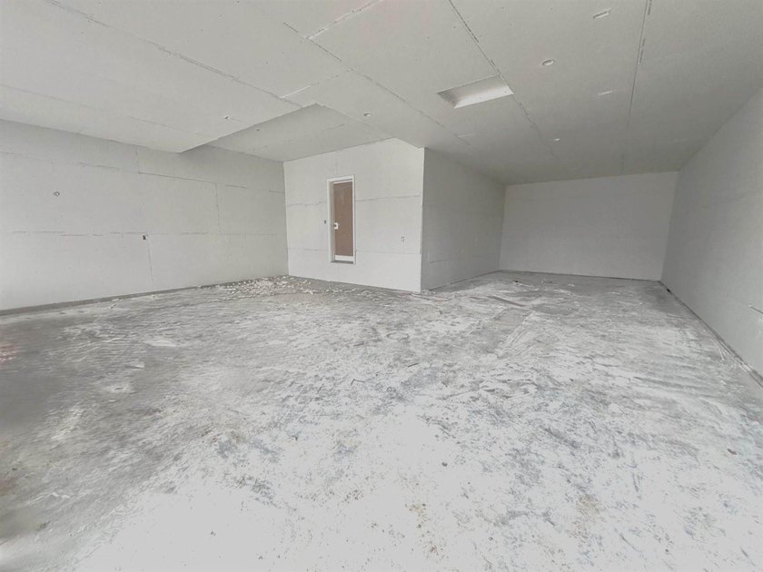 Highlights include a spacious 4 BAY GARAGE, Two Story modern - photo 16