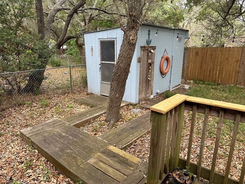 Hang up your fishing poles and settle into this charming coastal - photo 20