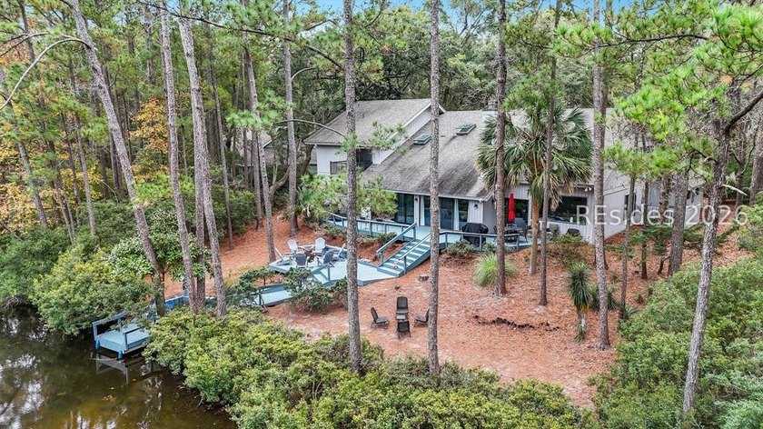 Unique home with a covered, heated pool and bi-fold doors that - photo 3