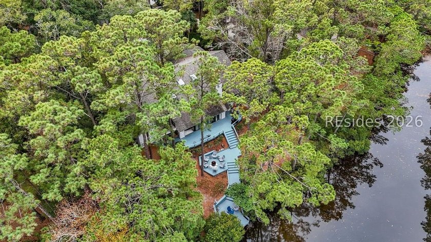 Unique home with a covered, heated pool and bi-fold doors that - photo 5
