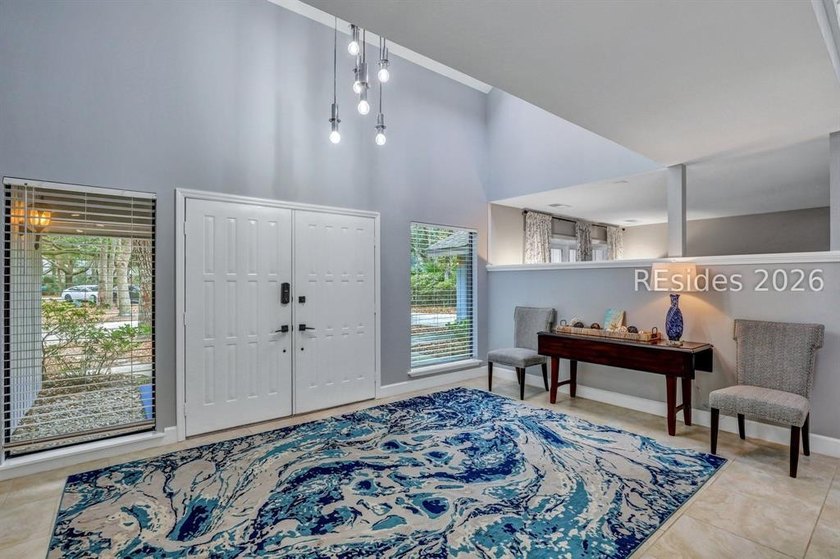 Unique home with a covered, heated pool and bi-fold doors that - photo 10