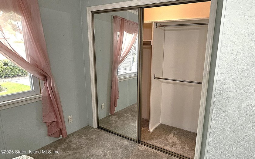 Pride of ownership shines throughout this lovingly maintained - photo 6