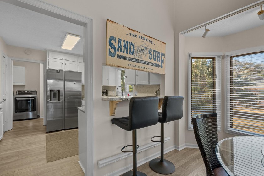 Southern charm by the coast! Welcome to Arcadian Shores, a - photo 9