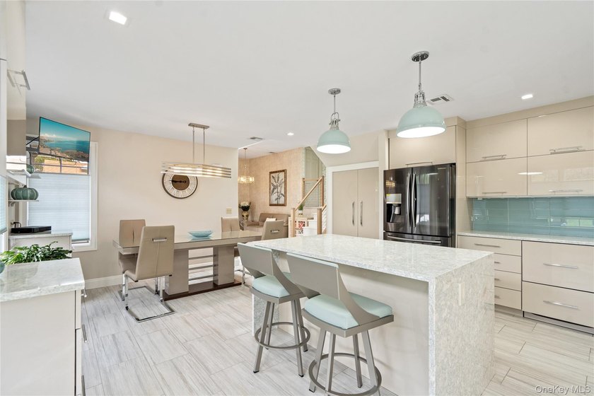 Welcome home to 939 Manor Lane in Bay Shore. This meticulously - photo 10