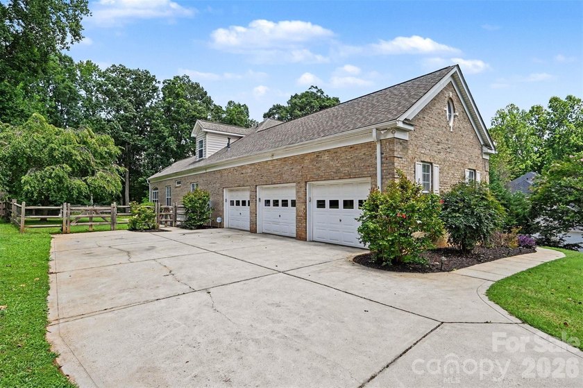 Nestled on nearly an acre in the desirable Edgewater Park - photo 3