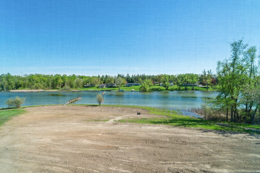 Brand new construction on the beautiful Cheboygan River! Enjoy - photo 11