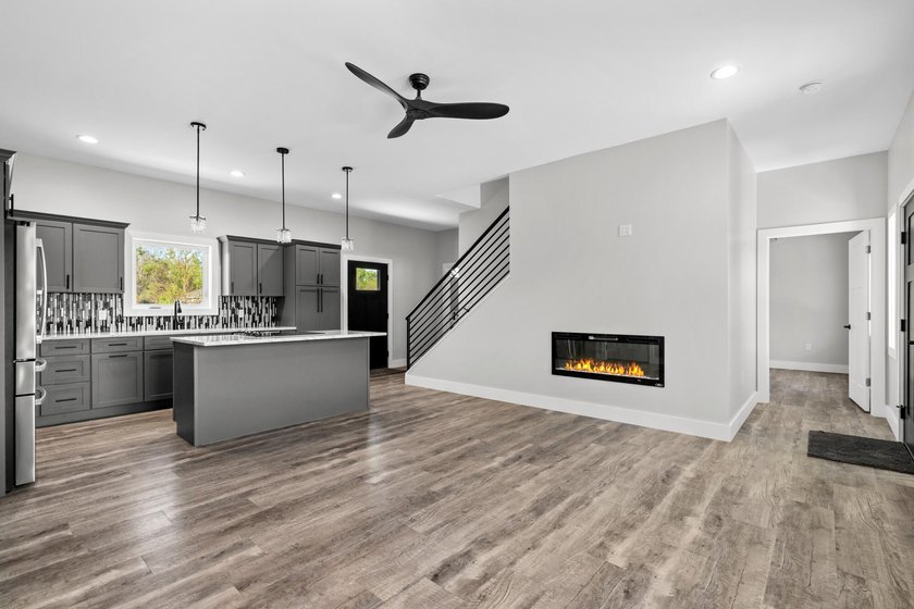 Brand new construction on the beautiful Cheboygan River! Enjoy - photo 12