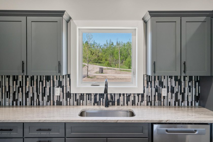 Brand new construction on the beautiful Cheboygan River! Enjoy - photo 16