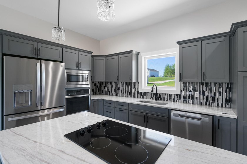 Brand new construction on the beautiful Cheboygan River! Enjoy - photo 17