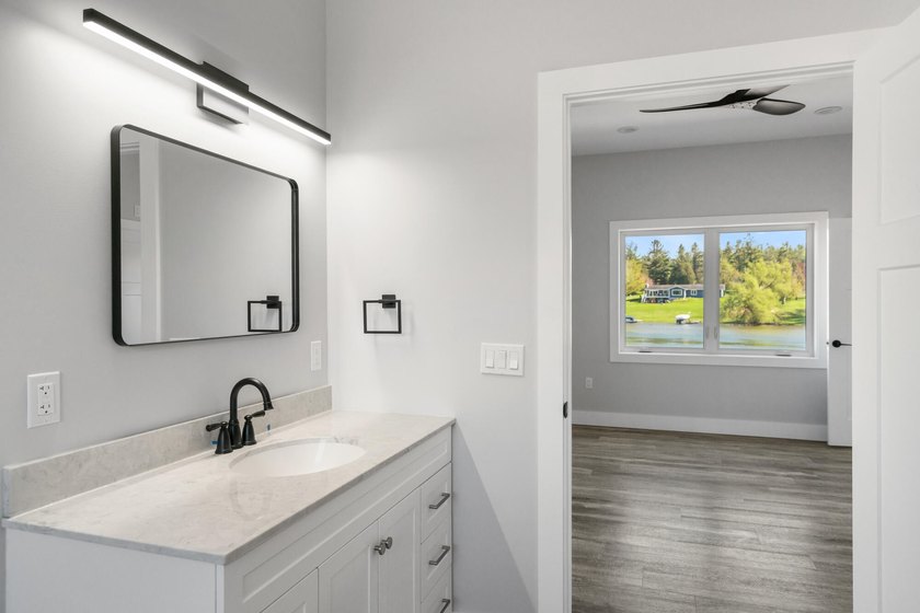 Brand new construction on the beautiful Cheboygan River! Enjoy - photo 31