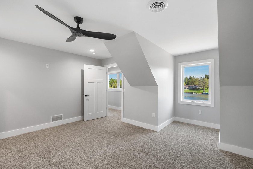 Brand new construction on the beautiful Cheboygan River! Enjoy - photo 38