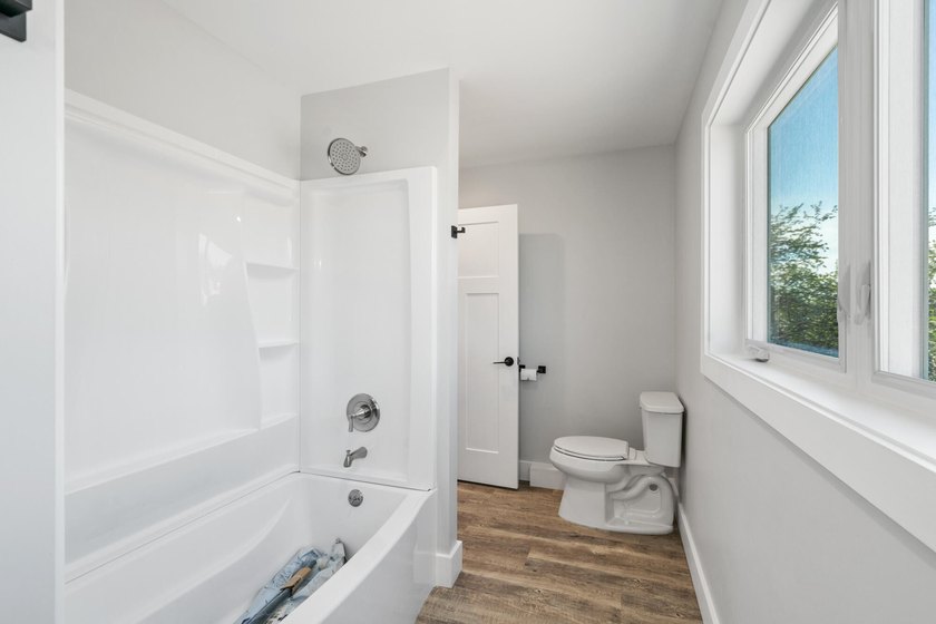 Brand new construction on the beautiful Cheboygan River! Enjoy - photo 44
