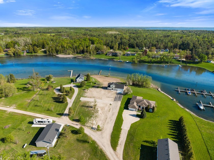 Brand new construction on the beautiful Cheboygan River! Enjoy - photo 48