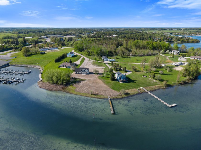 Brand new construction on the beautiful Cheboygan River! Enjoy - photo 49