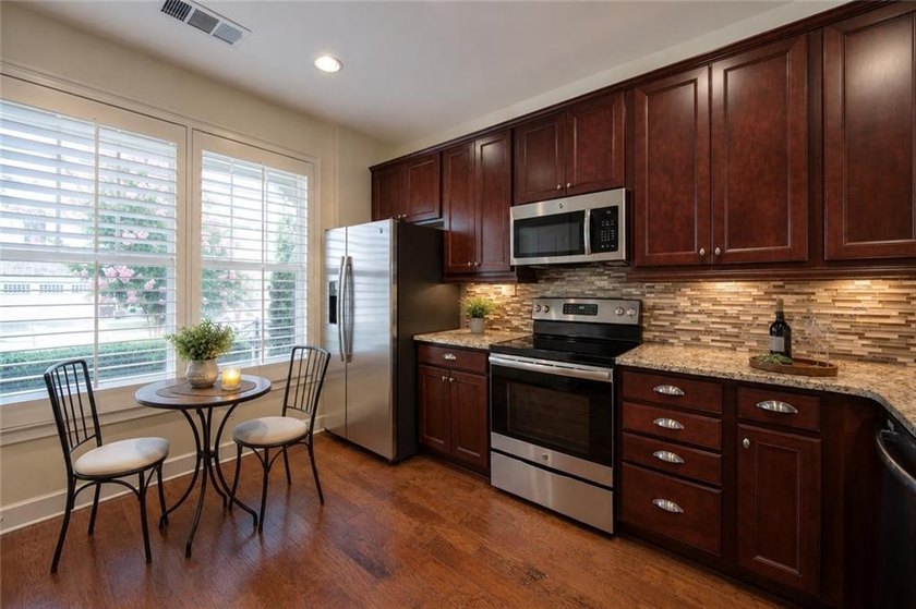 Welcome home to effortless luxury in one of Lake Lanier's most - photo 9