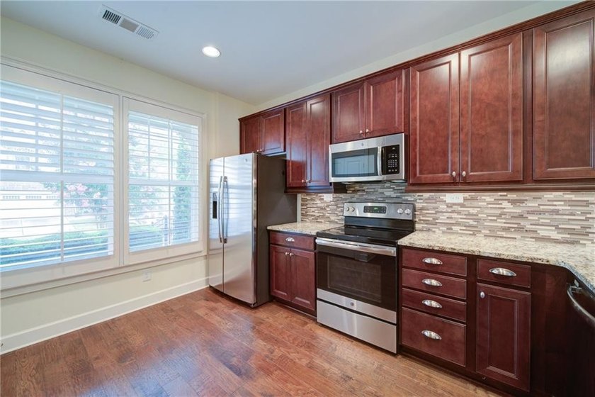 Welcome home to effortless luxury in one of Lake Lanier's most - photo 10