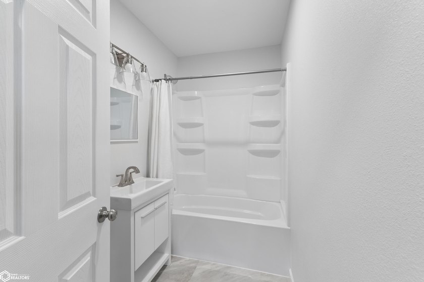 Beautifully remodeled and move-in ready, this charming home - photo 12