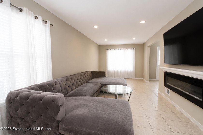 Welcome to 126 Tyrrell Street a 3-bedroom, 3-bath two-family - photo 5